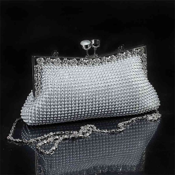 

cat's eye inlaid with diamond aluminum sheet banquet bride nightclub dress fashion slant cross hand bag