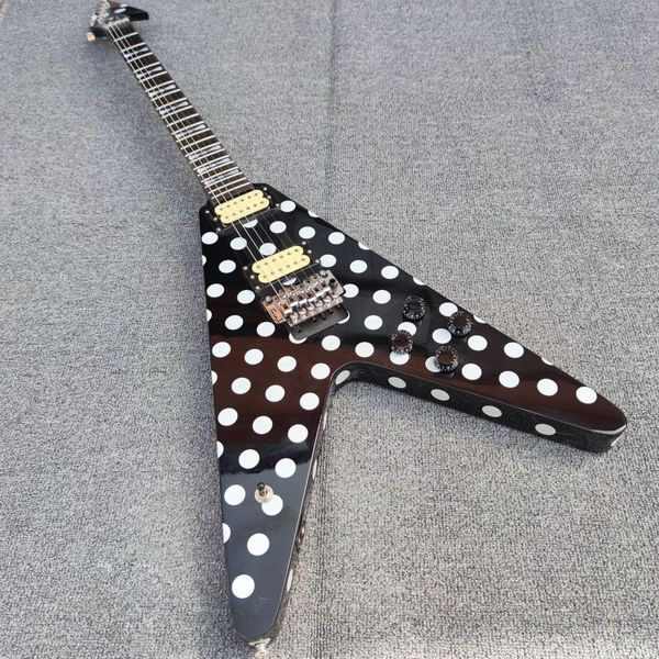

v-shaped electric guitar, log mahogany musical instrument, red sandalwood tuning fork, chrome plated hardware, high quality