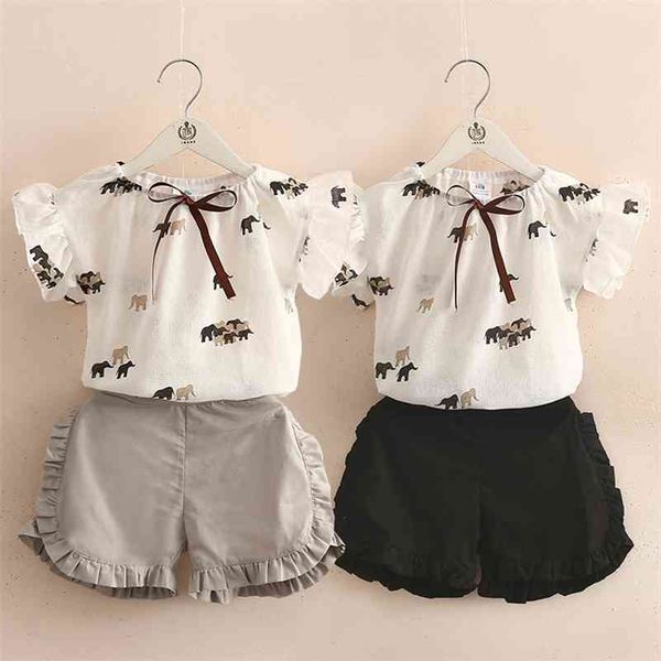 

summer fashion 2 3 4 5 6 7 8 9 10 years print fly short sleeve bow t-shirt+cotton shorts 2 pieces sets for kids baby girls 210701, White