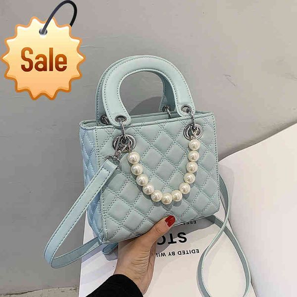 

2021 summer new fashion simple women's one shoulder portable princess of wales bag lingge solid color temperament pearl messenger bag