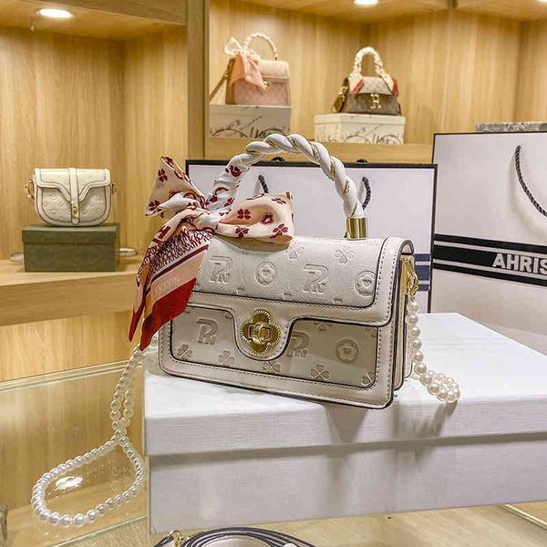 

2022 factory wholesale designer handbags on clearance special red women's silk scarf messenger high level embossed small square yvsx