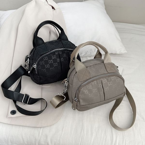 

factory direct sale 75% off small square women's new nylon 2021 letter korean version one shoulder mommy leisure messenger bags