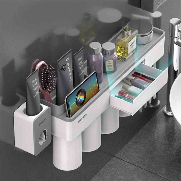 Portaspazzolino ad adsorbimento magnetico Dispenser per dentifricio Scatola portaoggetti a parete Set accessori bagno multifunzione 210423