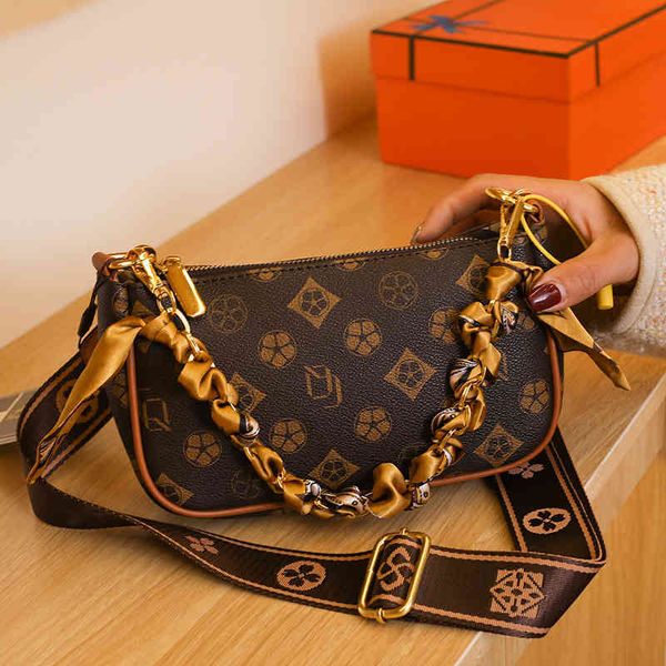 

2022 factory wholesale net red foreign style chain niche bag women's spring fashion versatile wide shoulder strap single shoulder messe