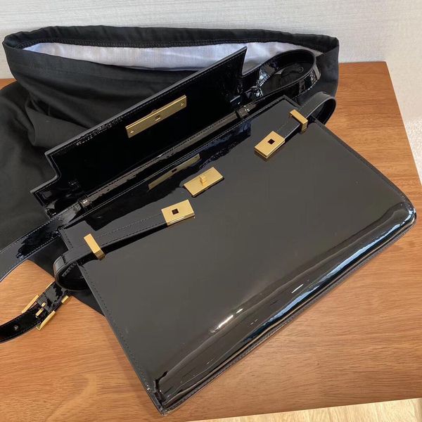 

manhattan baguettes in patent gold arrived patent leather fabrics give a different sense of high it has a magical power fashion bags