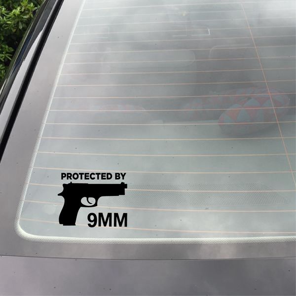 

protected by the gun 9mm bumper vinyl car sticker firearm gun ammo decor