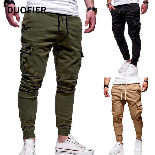 Homens calças hip hop harem calças calças corredores sólidos multi-bolso pista calça macho elástico preto suor casual sweatpants 4xl 210603