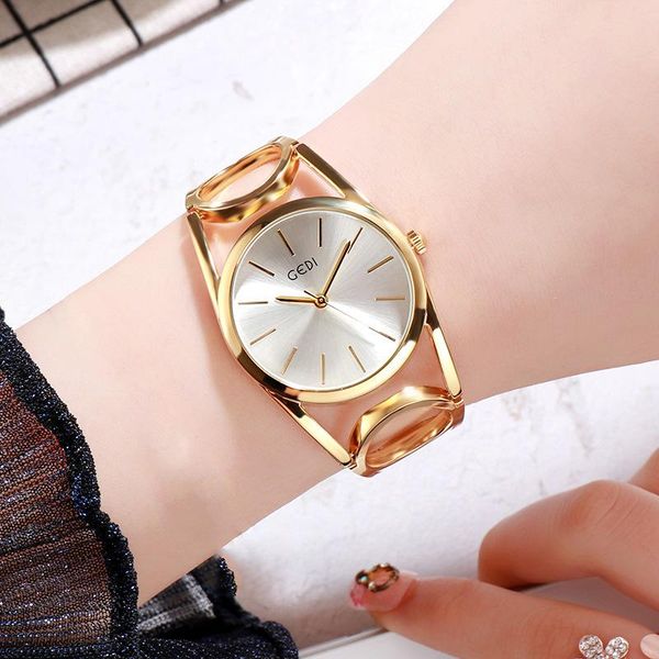 

wristwatches europe and the united states women's watch temperament hollow big dial waterproof quartz, Slivery;brown