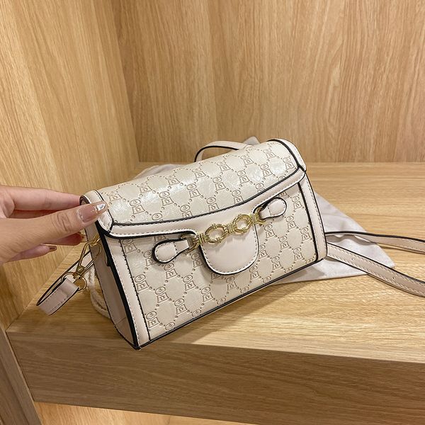 

factory outlet design saddle small square female 2021 summer new trend fashion net red single shoulder messenger embossed foreign style bead