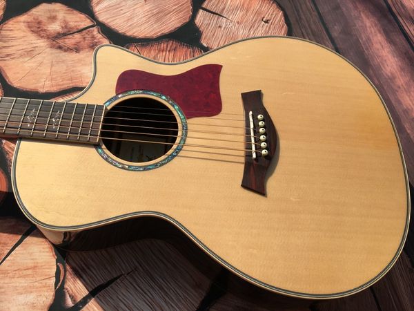 

new 2022 41" 6-string acoustic guitar with 814ce spruce and rosewood back.