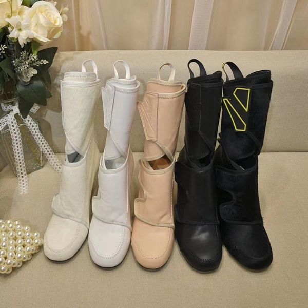 

the canister boots in luxurious stylist are recreational and sexy, Black