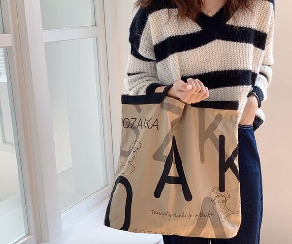 

dhl30pcs stuff sacks women canvas letter prints large capacity vertical section open handbag mix color