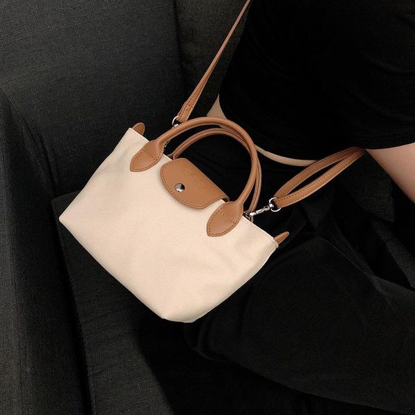 

evening bags 2021 summer canvas net celebrity cute small fresh brand wild western style dumplings women single-shoulder crossbody bag