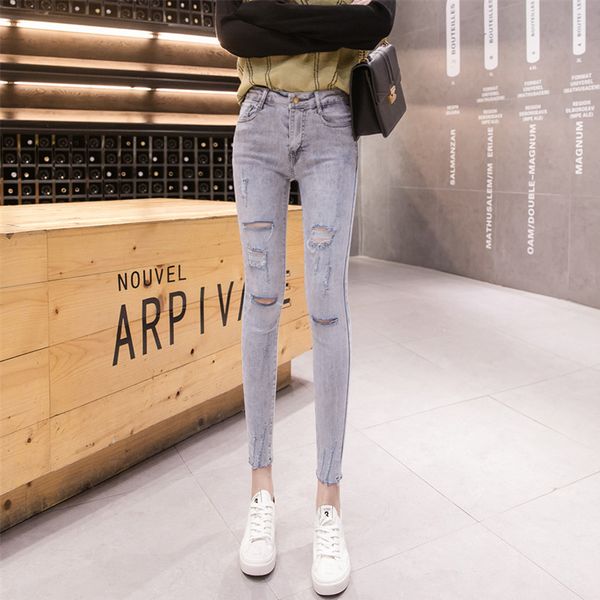 

kog36 light blue chun xia new chic hole in skinny jeans female foot show nine points pants pants play high tide