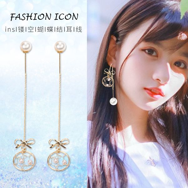 

korea east gate hollow bow pearl girl dream catcher earrings, Silver