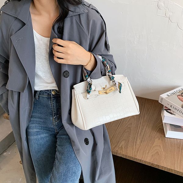 

with fashion crocodile bag stone lock in spring and summer 2021