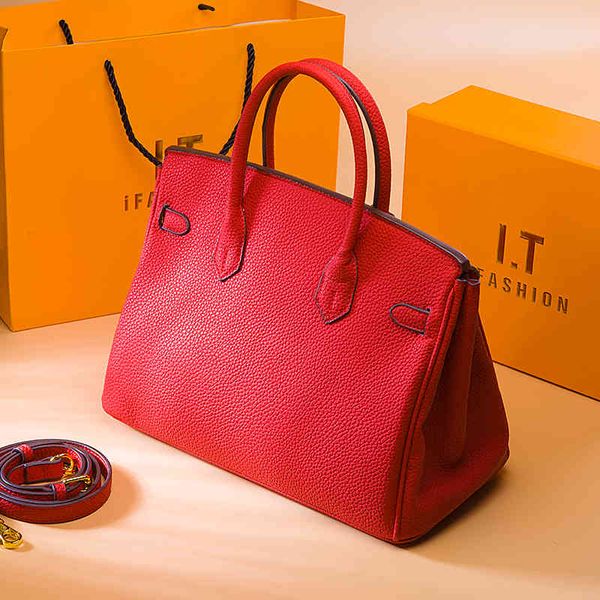 

small ck2021 new large capacity fashionable red hand-held women's bride wedding bag