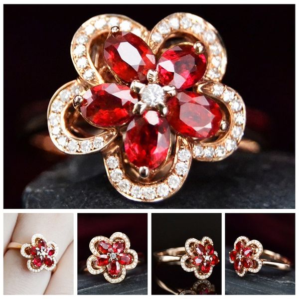 

red girl with plum shaped zircon opening ring, Silver