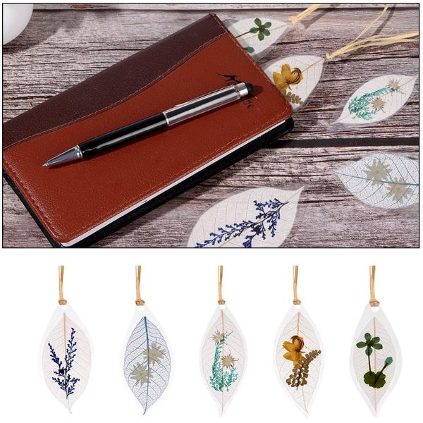 

bookmark pressed floral reading page with raffia tassel flowers leaf shaped dried transparent vein