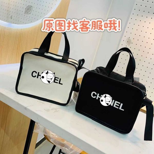 

designer luxury bag design shangxin large capacity portable canvas camera simple versatile small bow s women's leather handbag