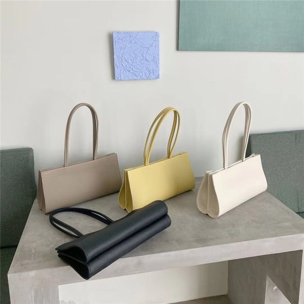 

2021 new solid color first layer cowhide litchi pattern single shoulder bag, small and simple temperament organ armpit stick bag