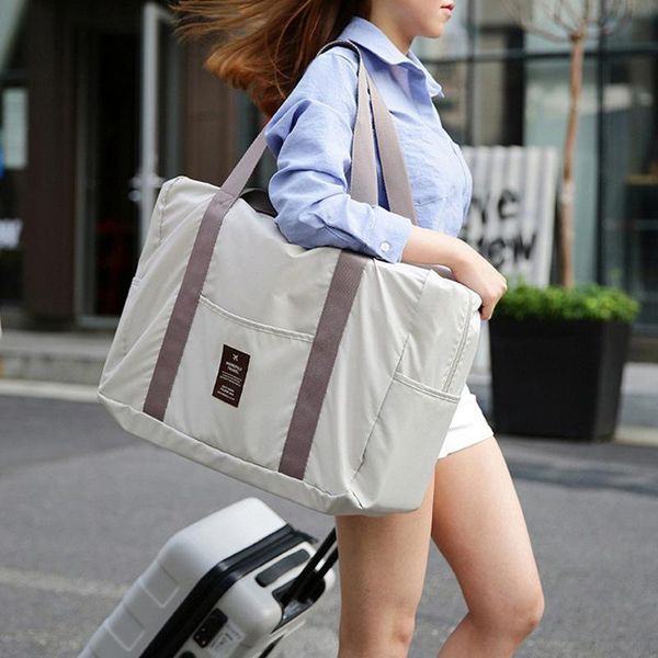 

duffel bags fashion capacity women portable waterproof nylon travel foldable shopping single shoulder bag sorting luggage receive