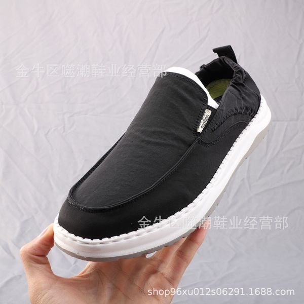 

2021 spring and summer new pure black low-canvas shoes round toe handmade spot casual flat heel mens shoes