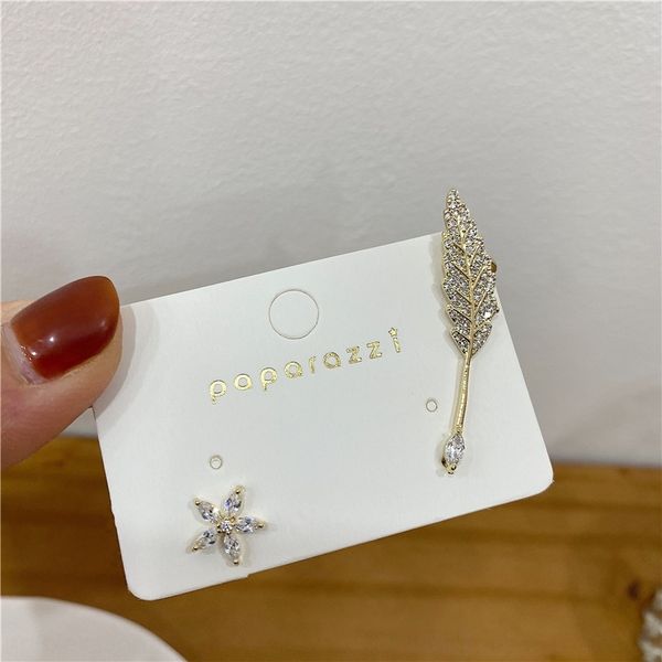 

W9s korean dongdamen's s and s same stud ring with asymmetric temperament integrated leaf ear clip earring s925 silver needle, Golden;silver