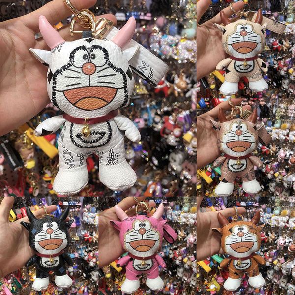 

classic creativity letters print cartoon doraemon keychains cute fashion brand designer puleather doll car key chain backpack handbags penda, Silver