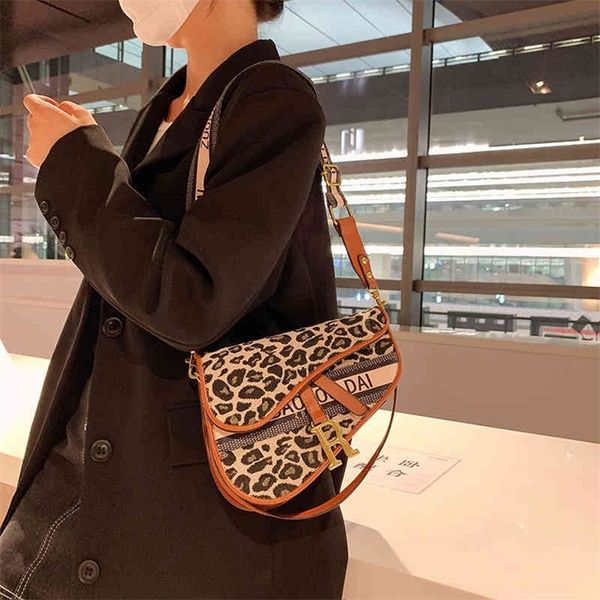 

70% off deals online 2022 autumn winter new saddle bag personality leopard print fashion trend women's single shoulder bag wide shoulde