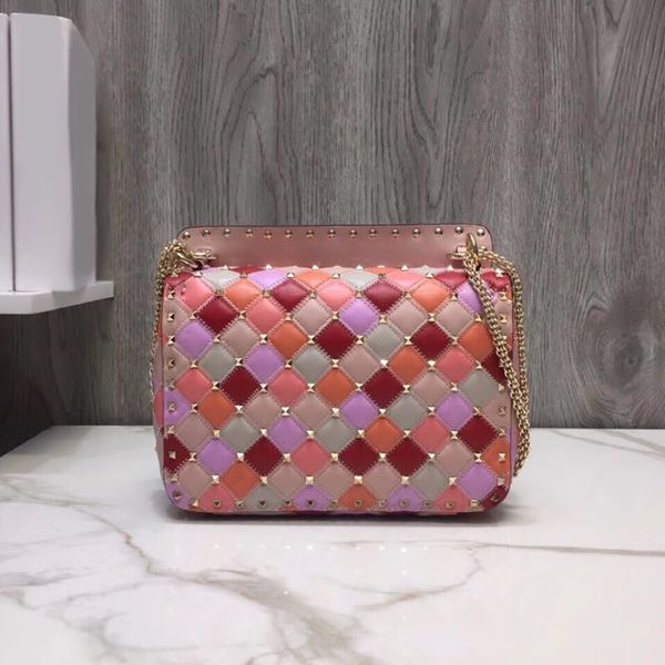 

style it is made of lamb skin fine technology and miniature rivet installation equipped with detachable handle v0122 graceful bag