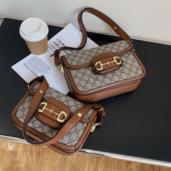 

luxury design handbag 2021 new net red, the same style, saddle underarm small square bean curd bag, one shoulder messenger bag