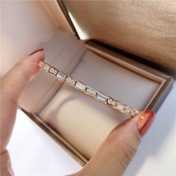 

baojia white shellfish snake bone bracelet 925 sterling silver plated 18k rose gold diamond inlaid snake, Golden;silver