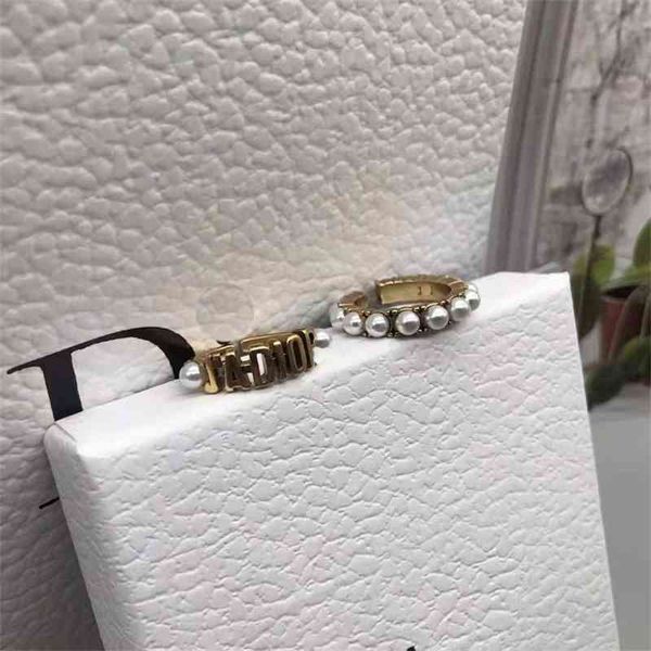 

aaa designer jewelry letter pearl fashion brass old ring female bkip, Silver