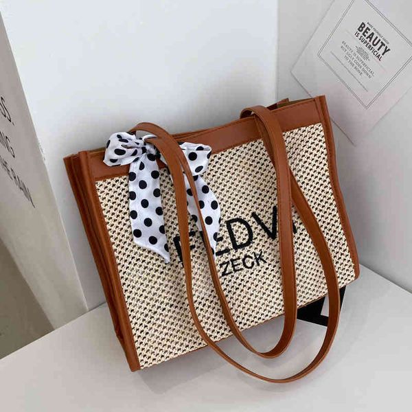 

2022 factory outlet online design net red tote spring and summer beach grass woven letter portable bag women's single shoulder messenge