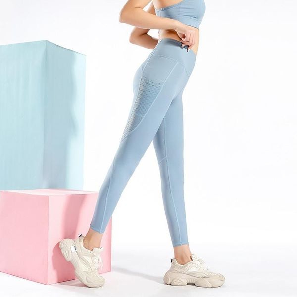 

yoga pants fashion trendy pocket cropped hollow breathable outdoor sports fitness bottoms outfit
