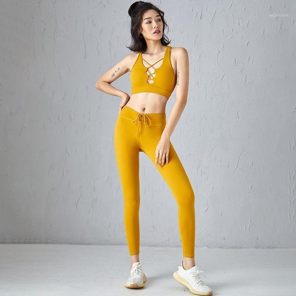 

yoga outfit spring/summer nude fitness suit female openwork sports bra pocket pants two-piece set
