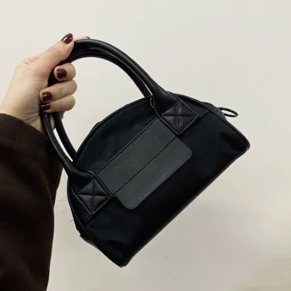 

2021 new college print leisure sports hand mix with fashion one shoulder messenger women's trend bag f 30d7