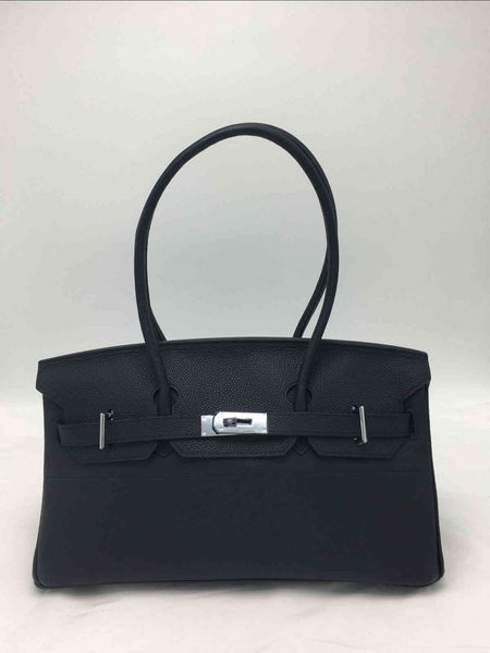 

a new leather lady's handbag large capacity simple handbag