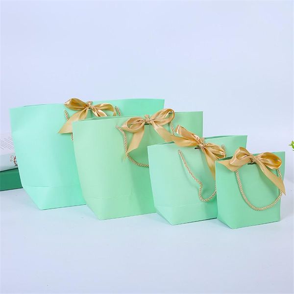 

gift wrap pretty light green paper bag bow present box for pajamas clothes books packaging gold handle kraft 10 pieces