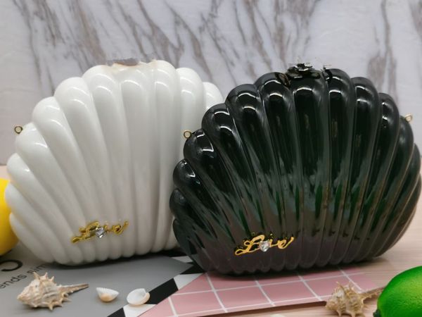 

cameo shell shape evening bag acrylic shoulder case classic pattern women bag white black 2 color makeup acrylic bag cameo shell style come