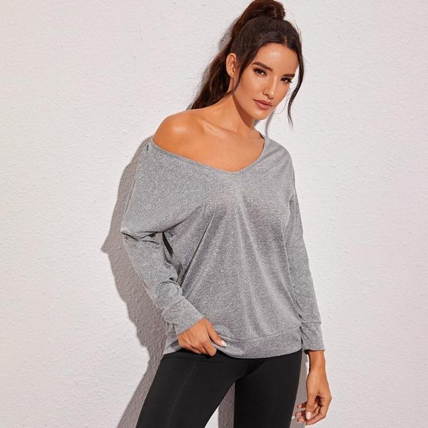 

yoga outfit woman long sleeve round neck criss cross back moisture wicking shirt