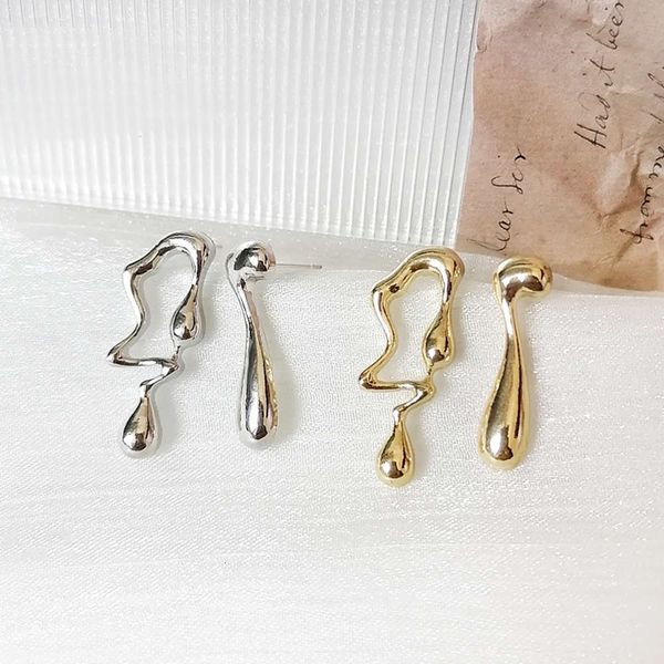 

asymmetric earrings exclamation question short