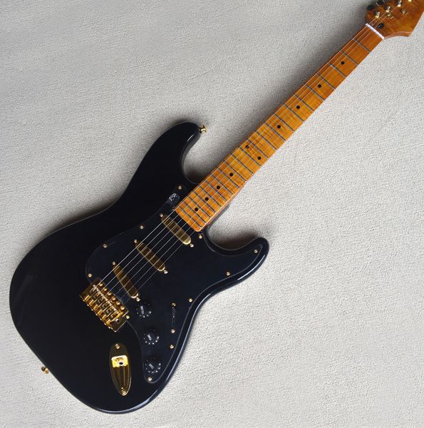 

black electric guitar birdseye flame maple neck and gold hardware pickups guita
