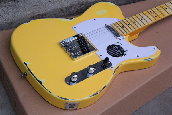 

relic tl electric guitar with yellow color