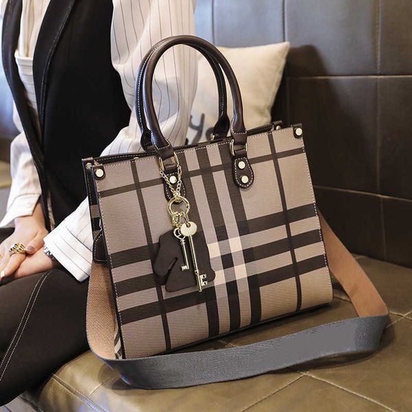 

hong kong leather hand-held messenger bag women's 2021 fashion high-capacity plaid briefcase summer