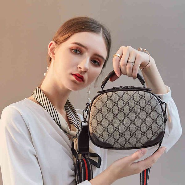 

2022 factory outlet online fashion small round bag new fashion women's shoulder versatile messenger printed hand kn9s