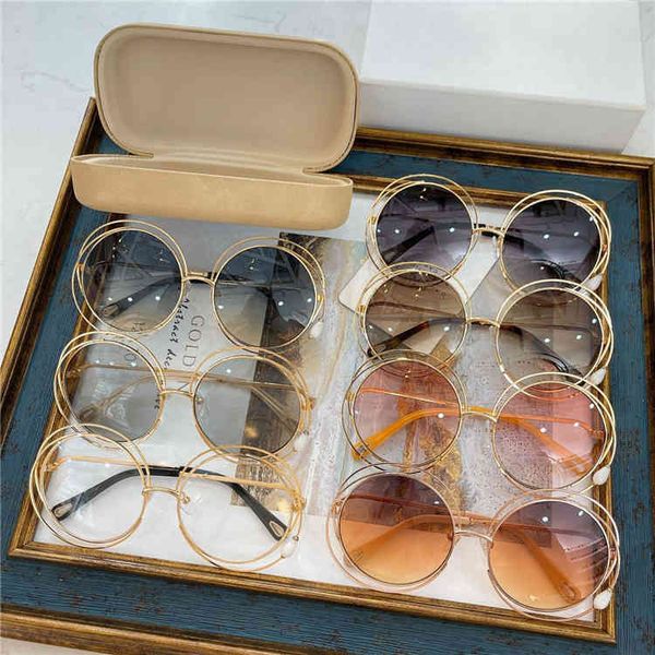 

2022 factory wholesale fashion metal oval pearl sunglasses star same sunglasses, White;black