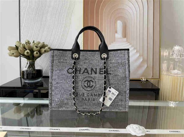 

chanel women's handbag rive gauche handbag shopping bag handbag fashion linen large beach bag luxury designer travel bag
