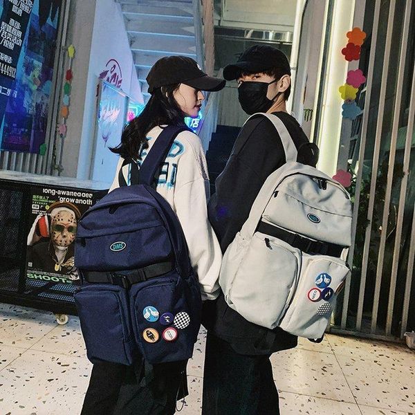 

backpack tooling style multi-pocket personalized design solid color large capacity boys and girls travel